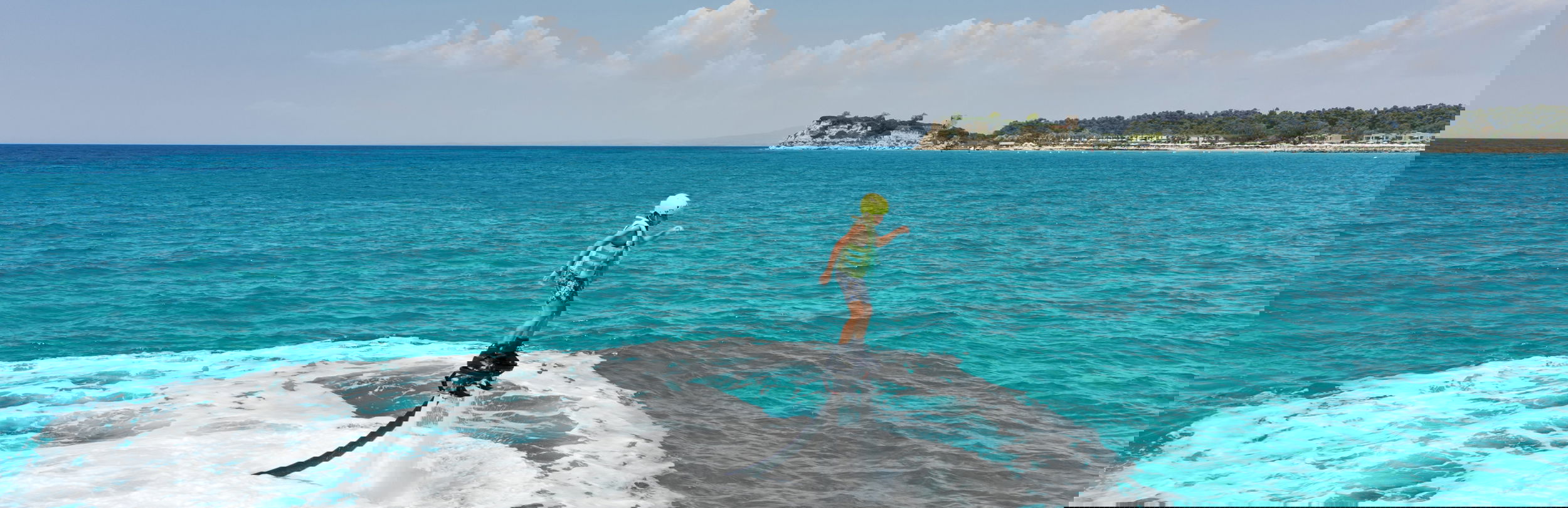 Man doing water sports in the sea at Sani Resort