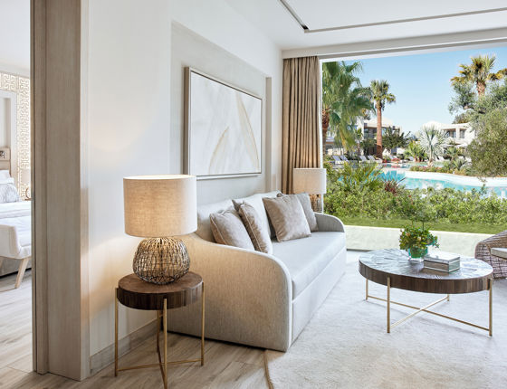Reception area in two bedroom suite with view of private garden