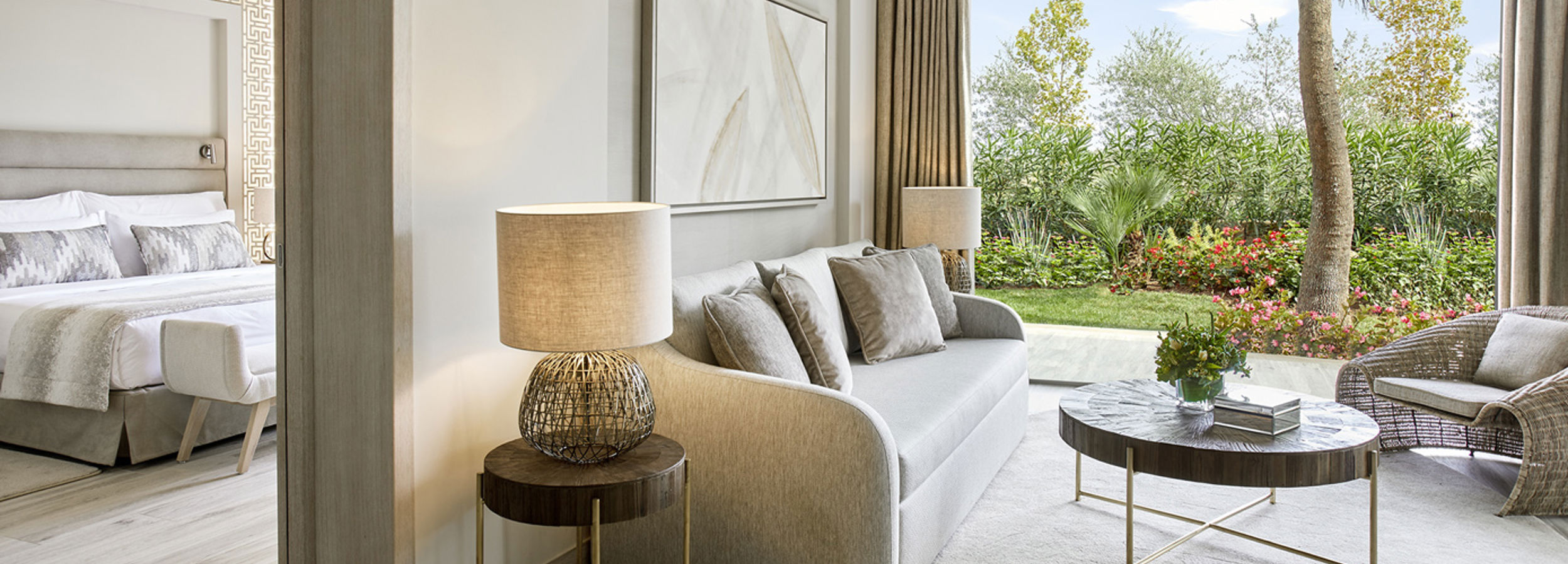 Reception area in one bedroom suite with view of private garden