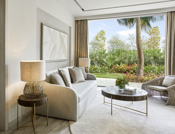 Reception area in one bedroom suite with view of private garden