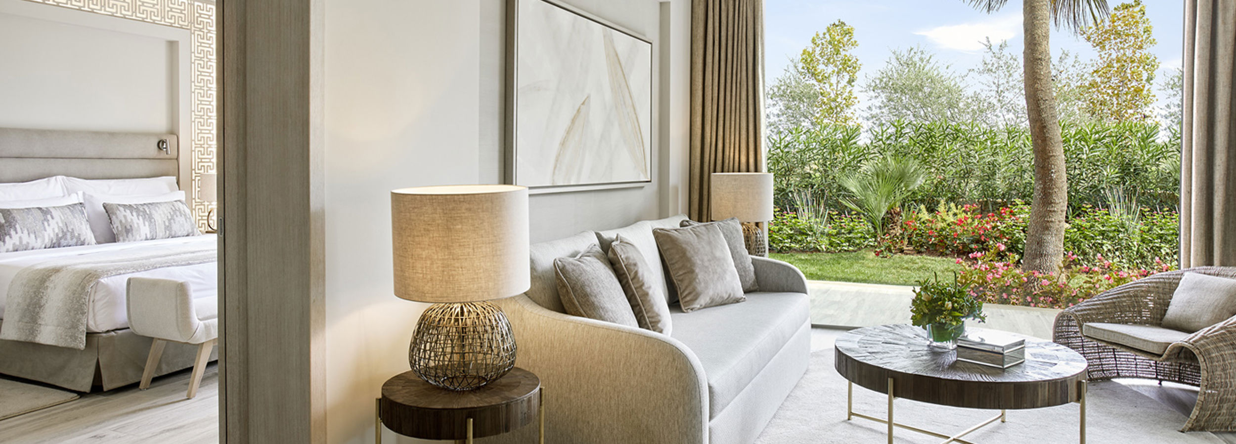 Reception area in one bedroom suite with view of private garden