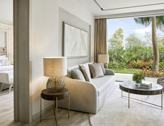 Reception area in one bedroom suite with view of private garden