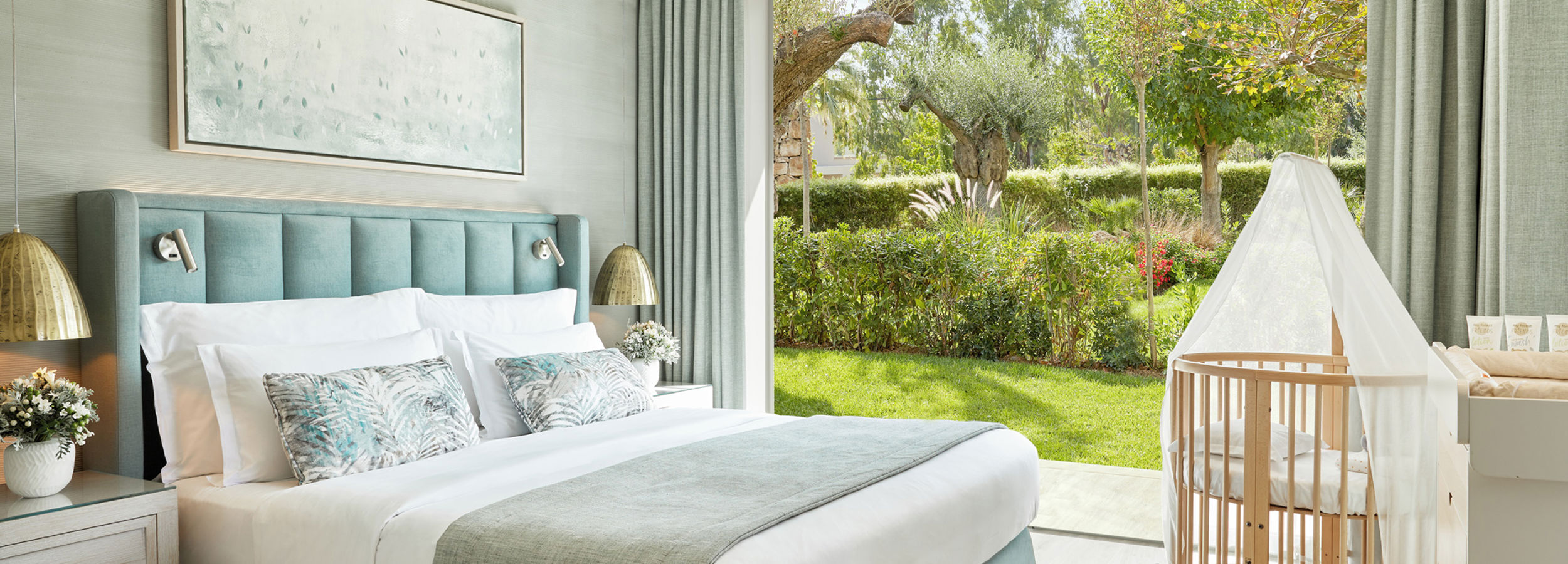 One bedroom with cot with view of private garden