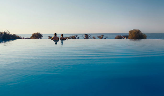 Cocktail glass against Mount Olympus at Sani