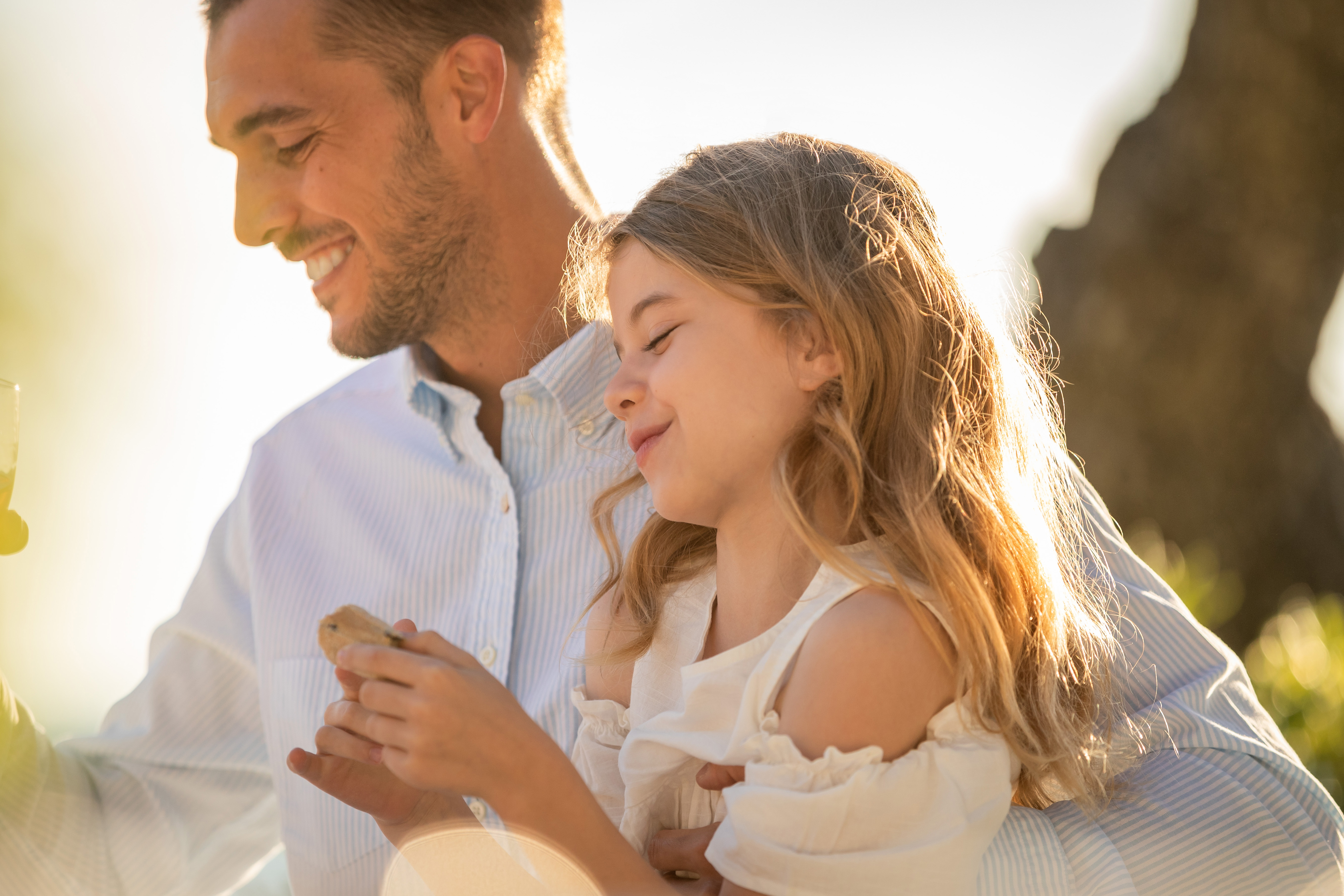 Father and daughter having dinner together 