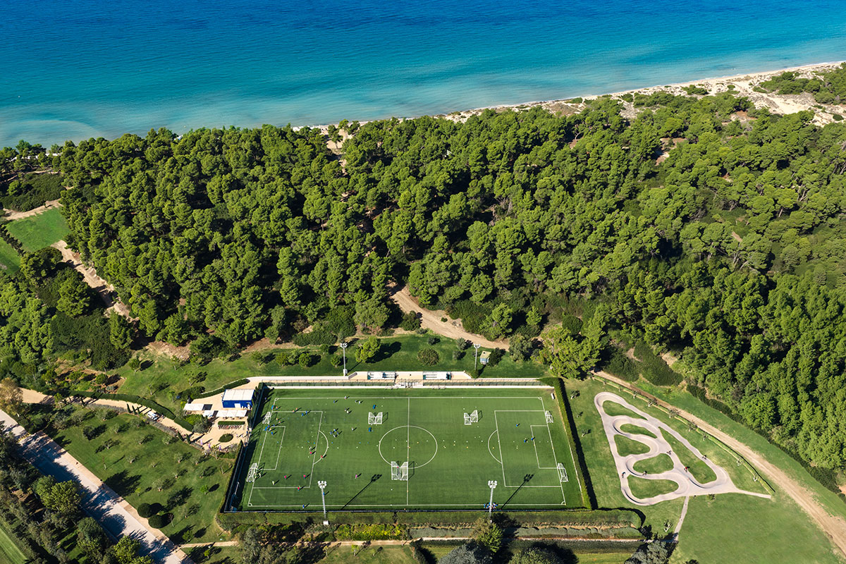 Sani beach pool with umbrella