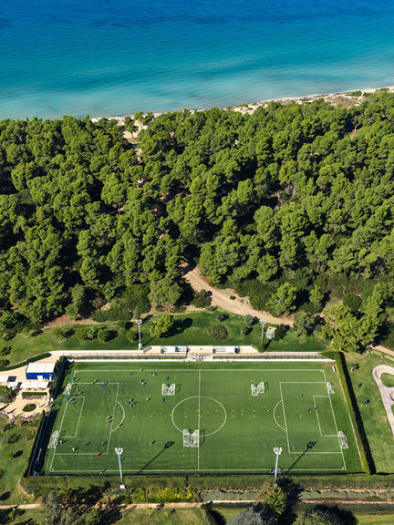 Sani beach pool with umbrella