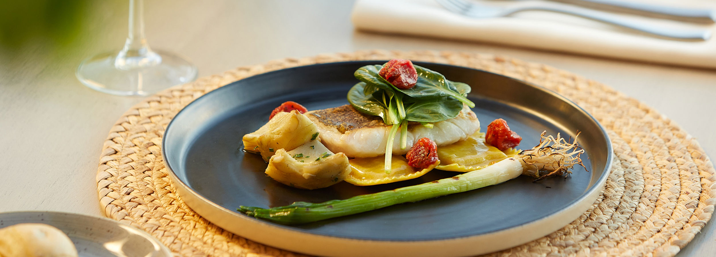 Ammos Restaurant at Sani Beach (Fish dish with spring onion)