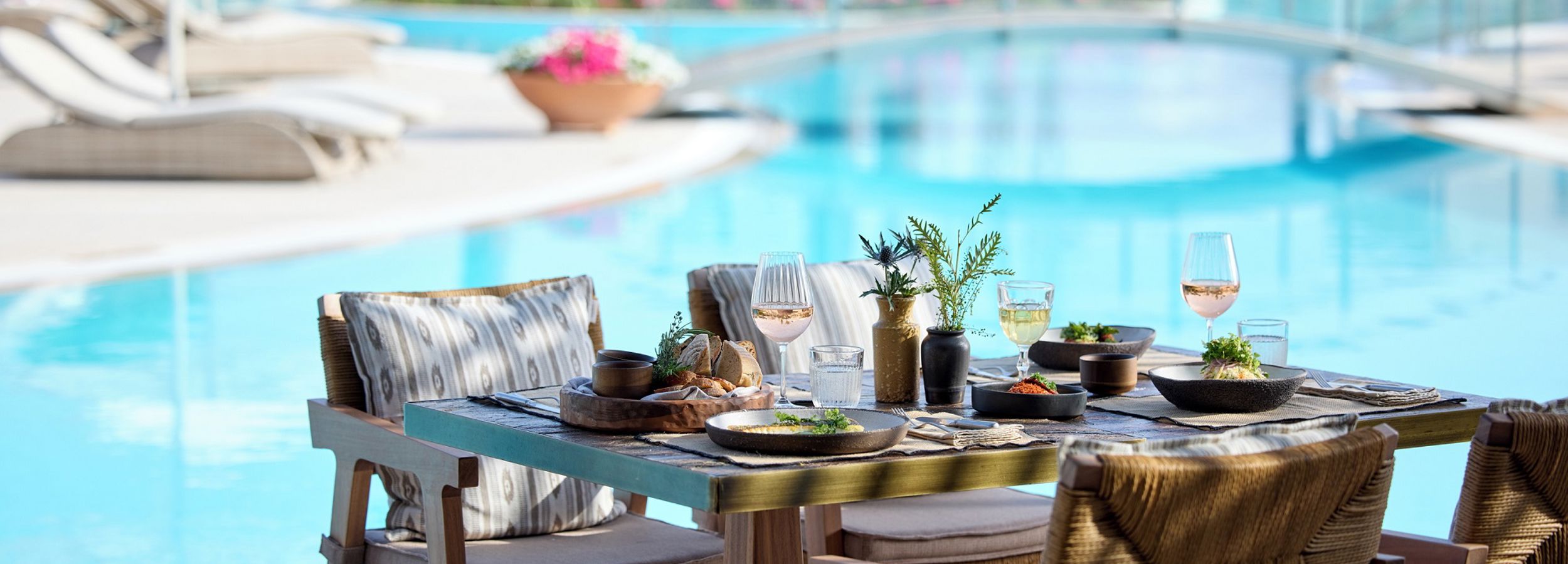 Porto Sani Elia Restaurant Table By The Pool