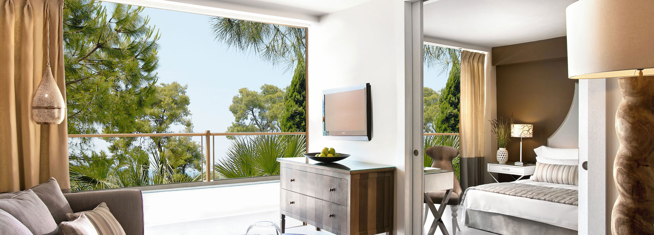 Family room with furnishings with garden view