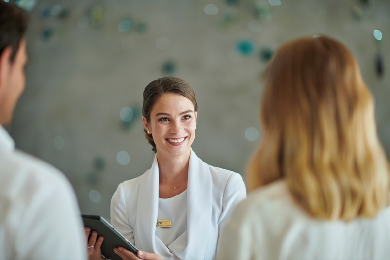 Couple speaking to medical professional 