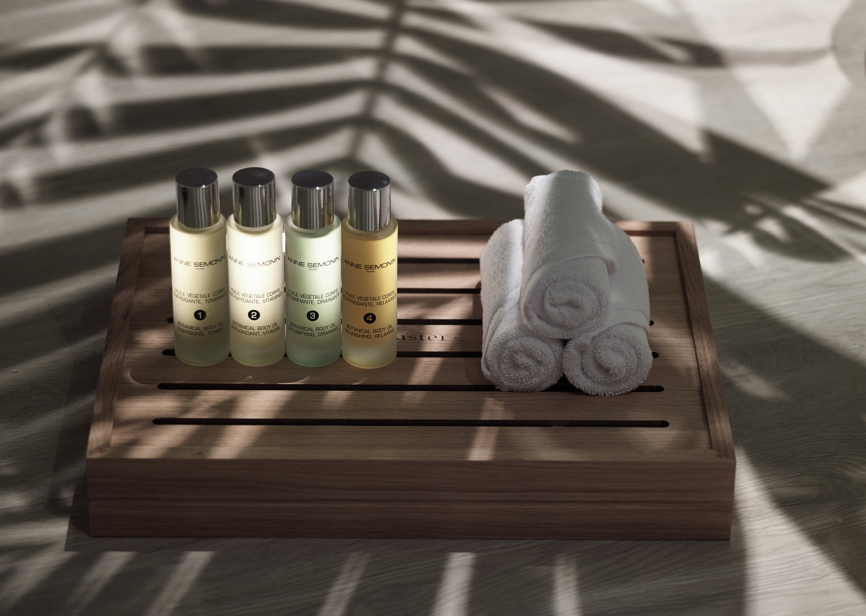 A lady having a massage with Spa products 