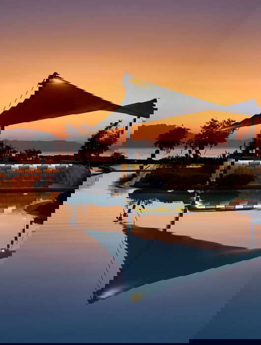 View of Sani Dunes pool bar at night