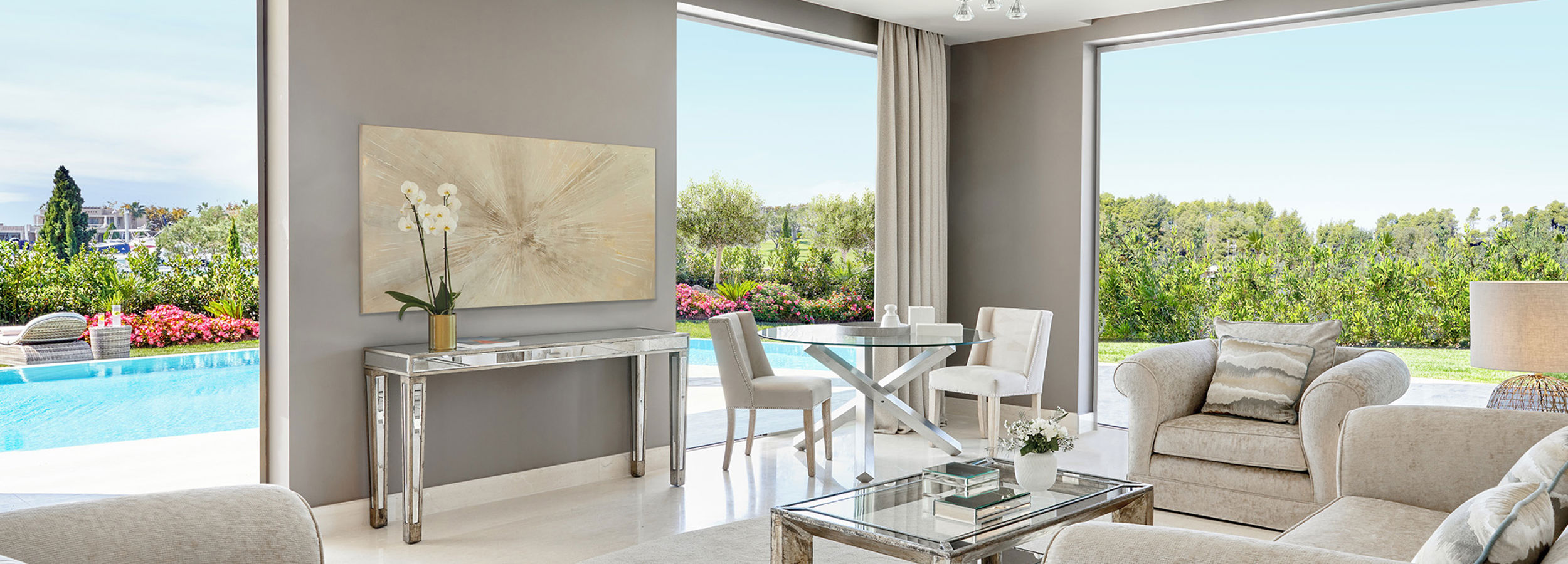 Large reception area in three bedroom family suite with private pool
