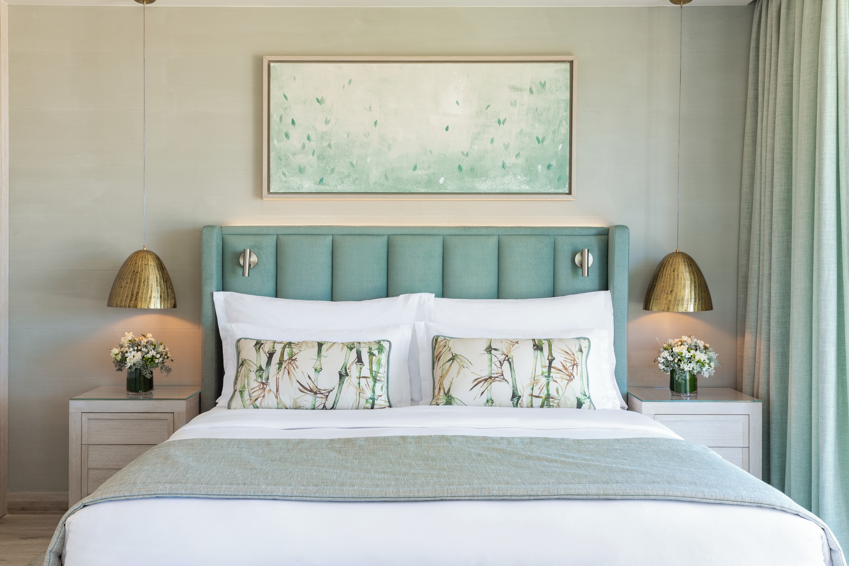 Close up of double bed with cushions 