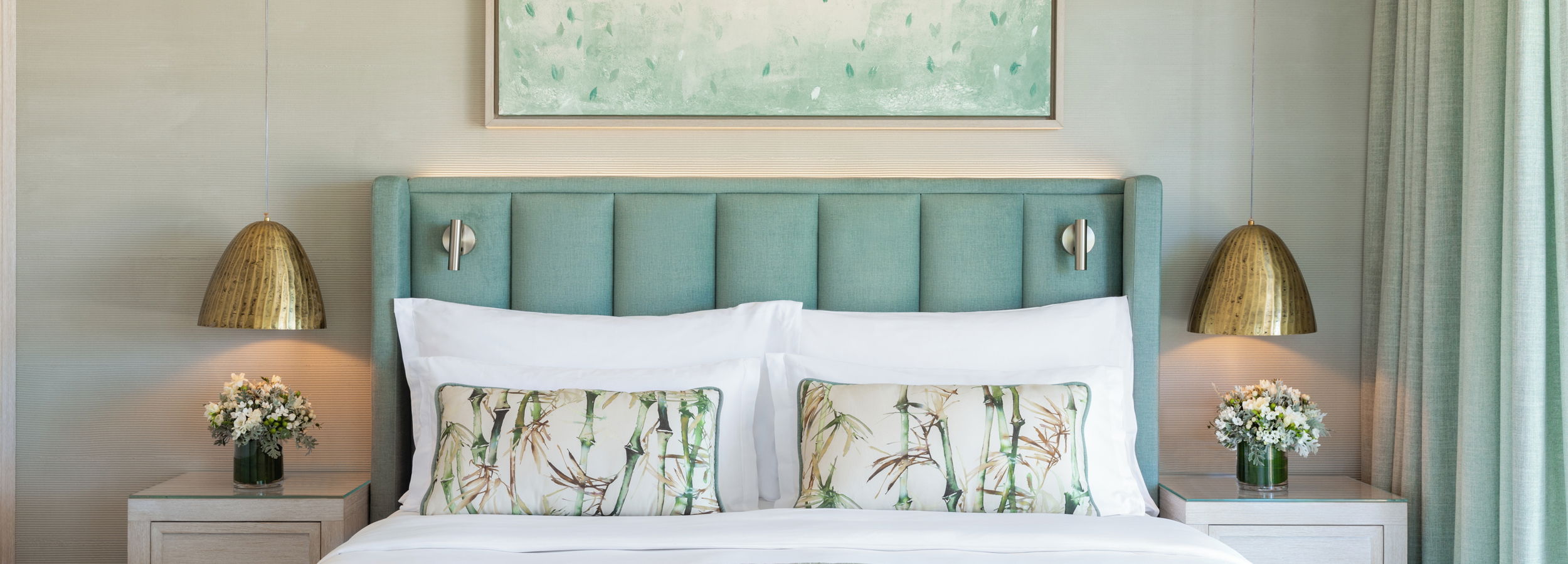 Close up of double bed with cushions